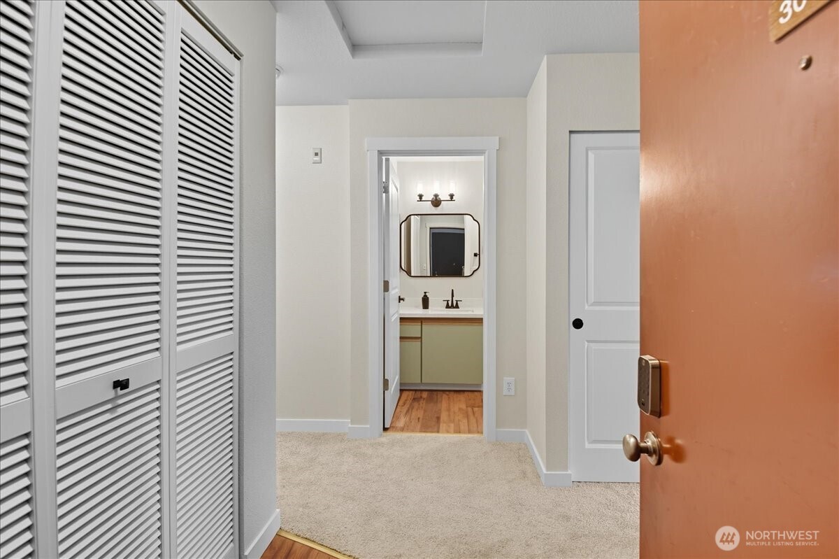 18150 73rd Avenue Northeast, Unit B306 Kenmore, WA 98028 - Photo 21 of 32 a view of a livingroom with a flat screen tv