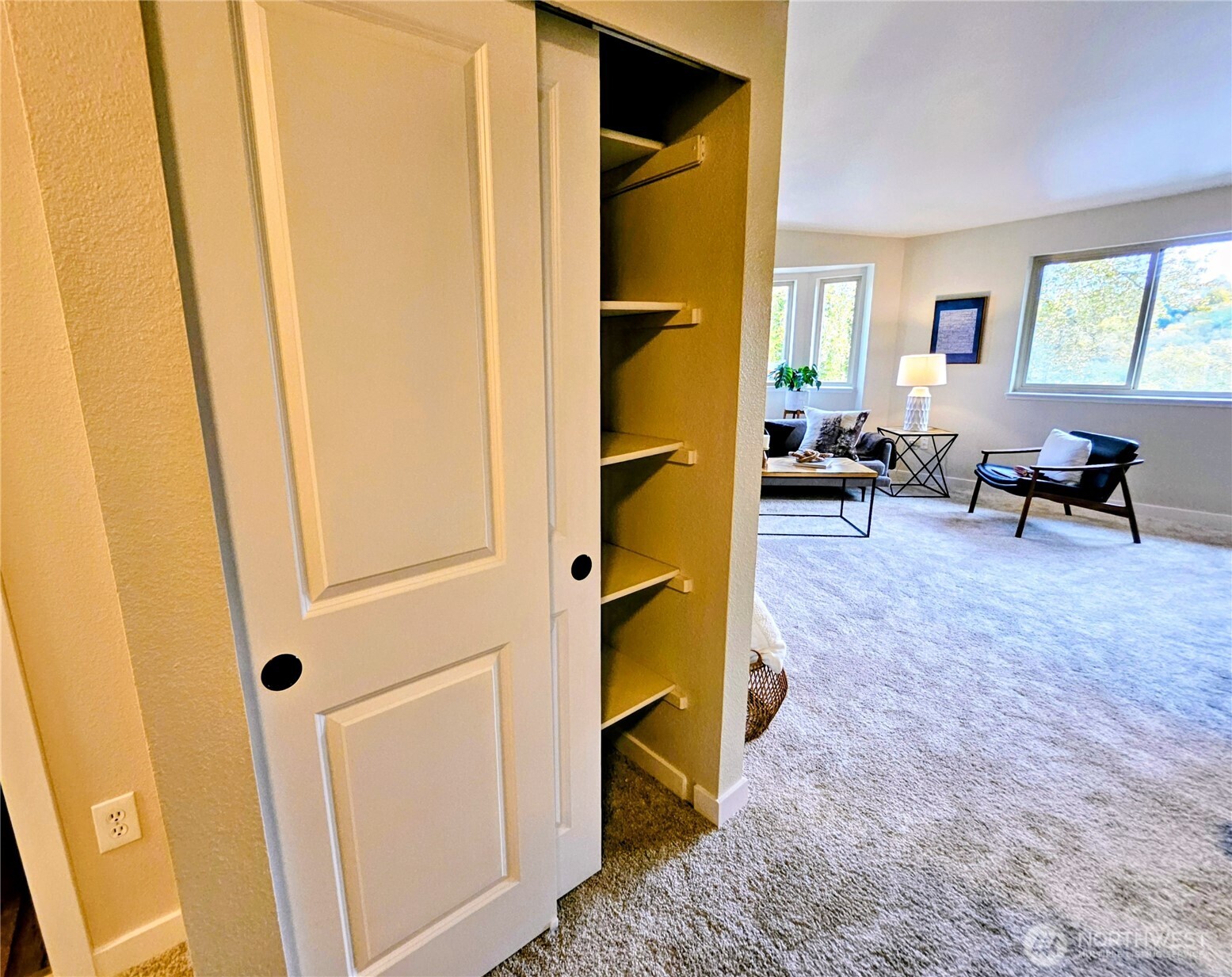 18150 73rd Avenue Northeast, Unit B306 Kenmore, WA 98028 - Photo 30 of 32 a living room with furniture and a window