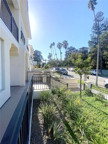 a view of balcony with outdoor seating and city view