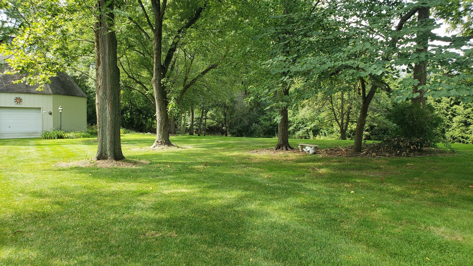 67 Round Barn Road Barrington Hills, IL 60010 - Photo 20 of 43 a view of a trees with a backyard