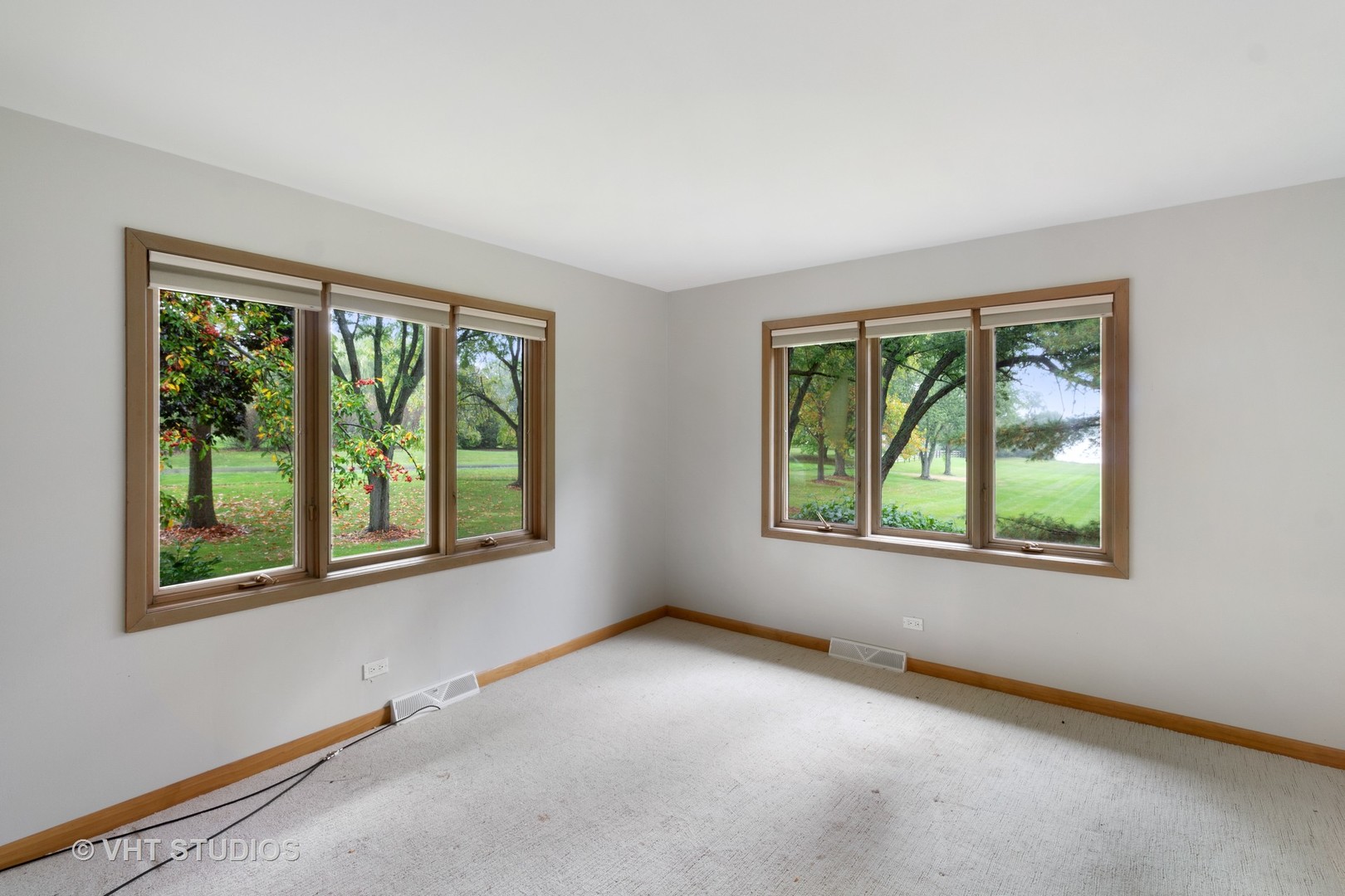 67 Round Barn Road Barrington Hills, IL 60010 - Photo 37 of 43 an empty room with windows