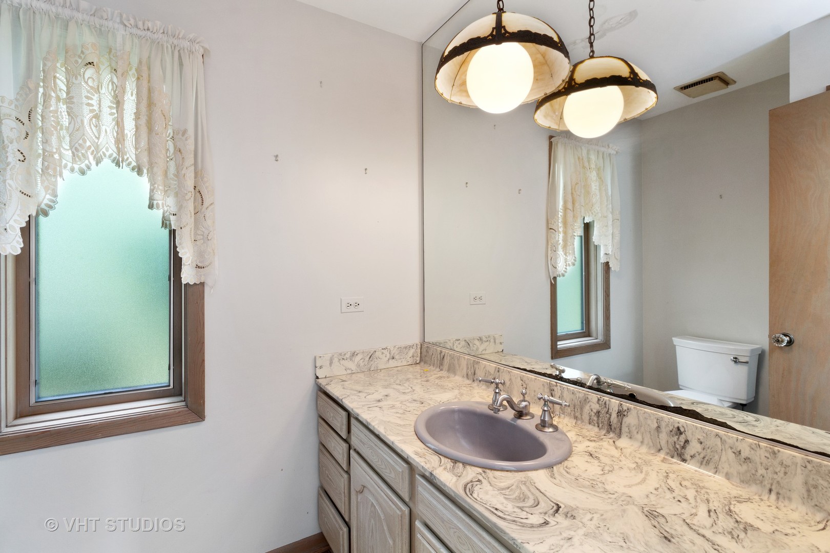 67 Round Barn Road Barrington Hills, IL 60010 - Photo 38 of 43 a bathroom with a granite countertop sink and a mirror