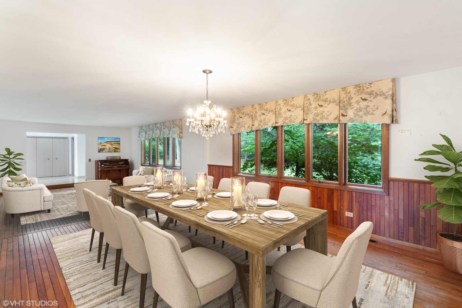 67 Round Barn Road Barrington Hills, IL 60010 - Photo 10 of 43 a view of a dining room with furniture a chandelier and wooden floor