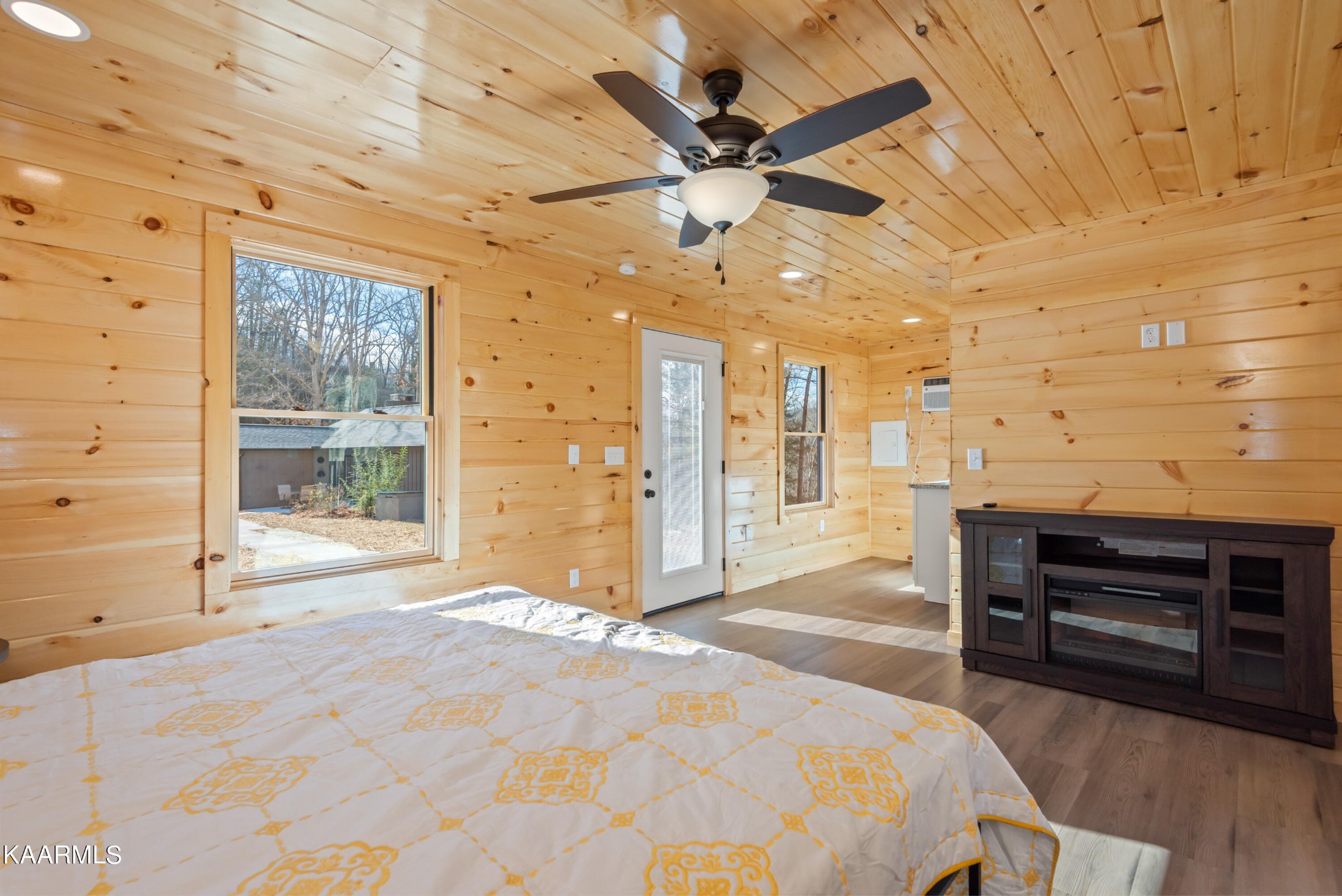 306 Glades Road Gatlinburg, TN 37738 - Photo 12 of 46 a bedroom with a bed and a flat screen tv
