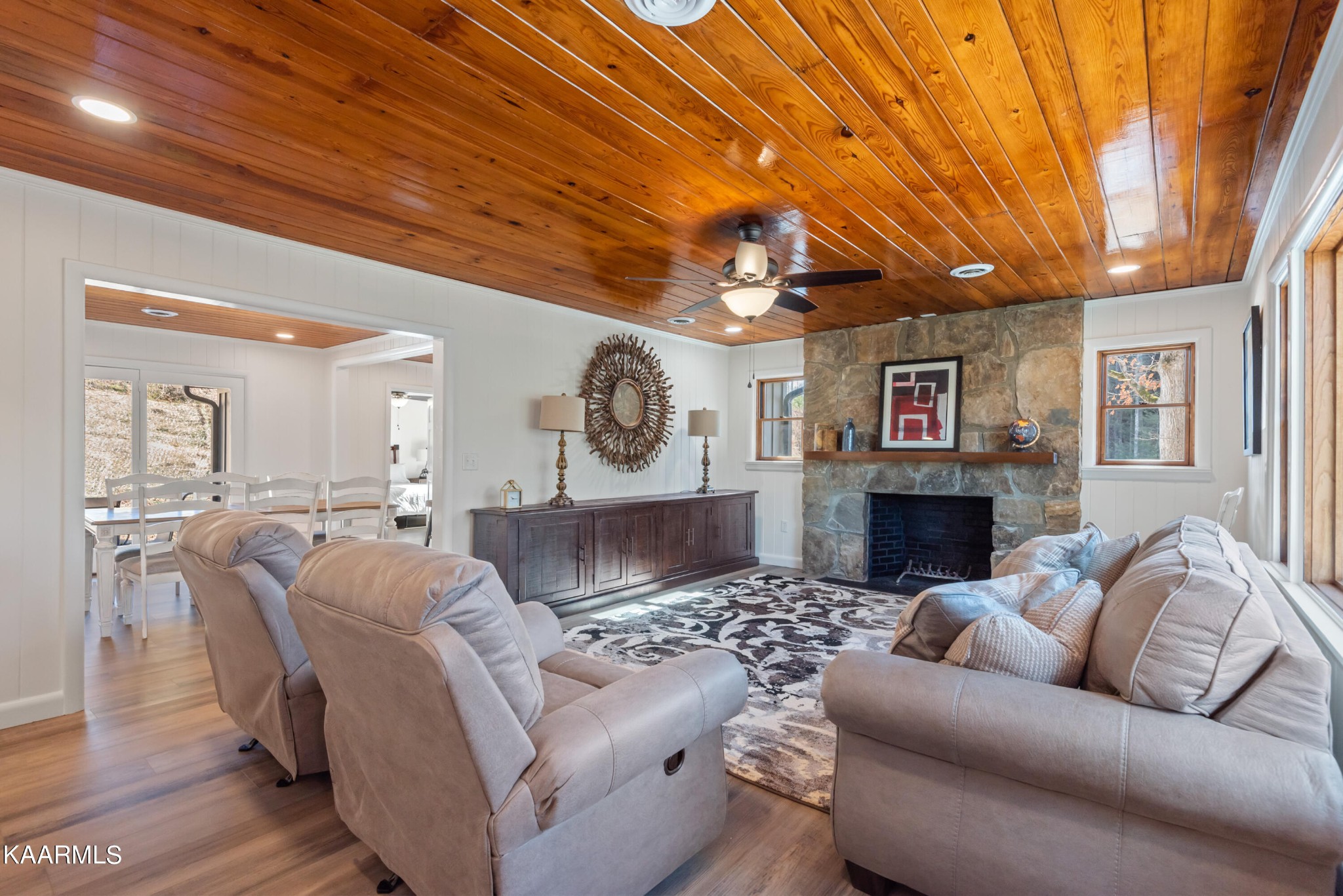 306 Glades Road Gatlinburg, TN 37738 - Photo 18 of 46 a living room with furniture and a fireplace
