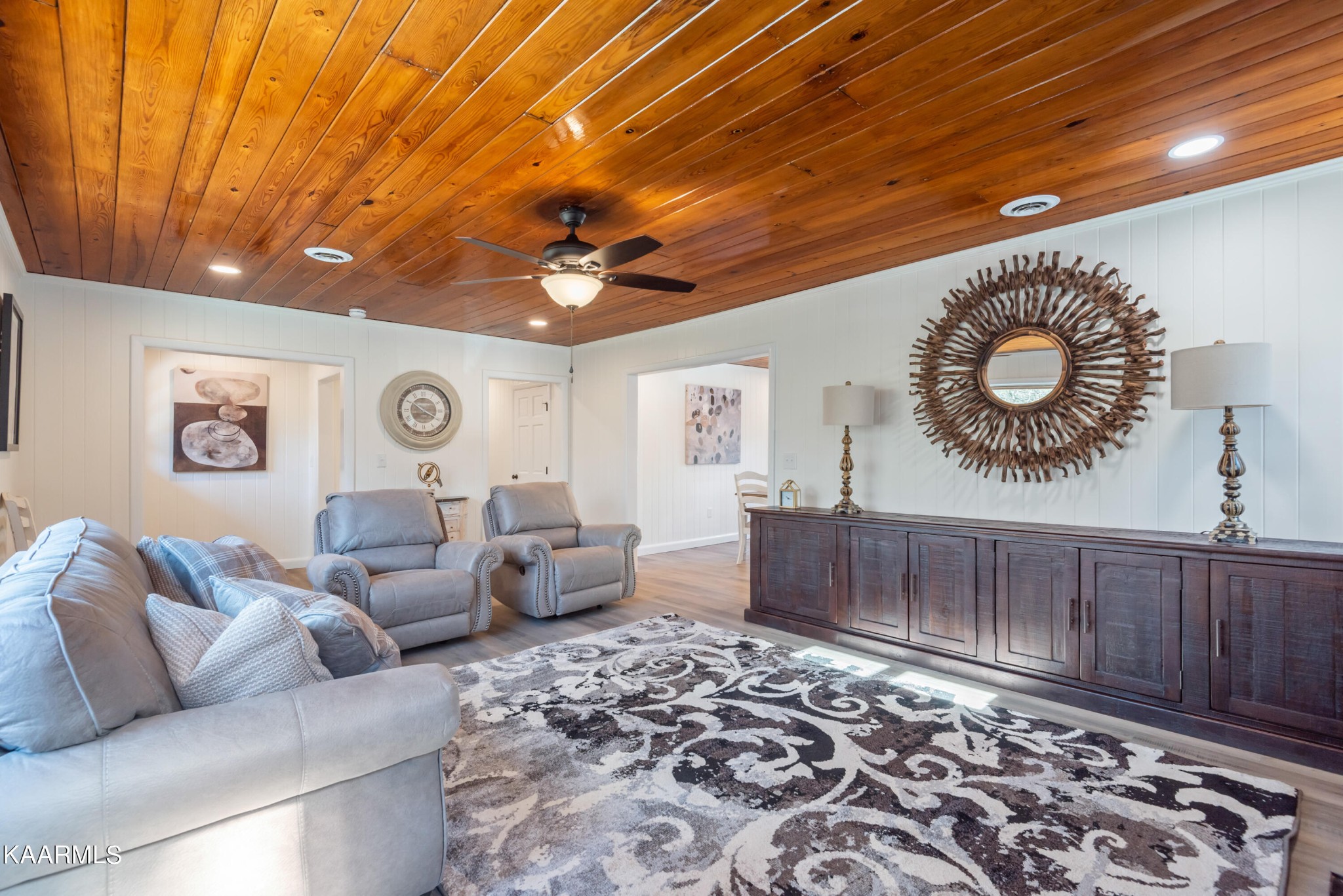 306 Glades Road Gatlinburg, TN 37738 - Photo 19 of 46 a living room with furniture and a chandelier