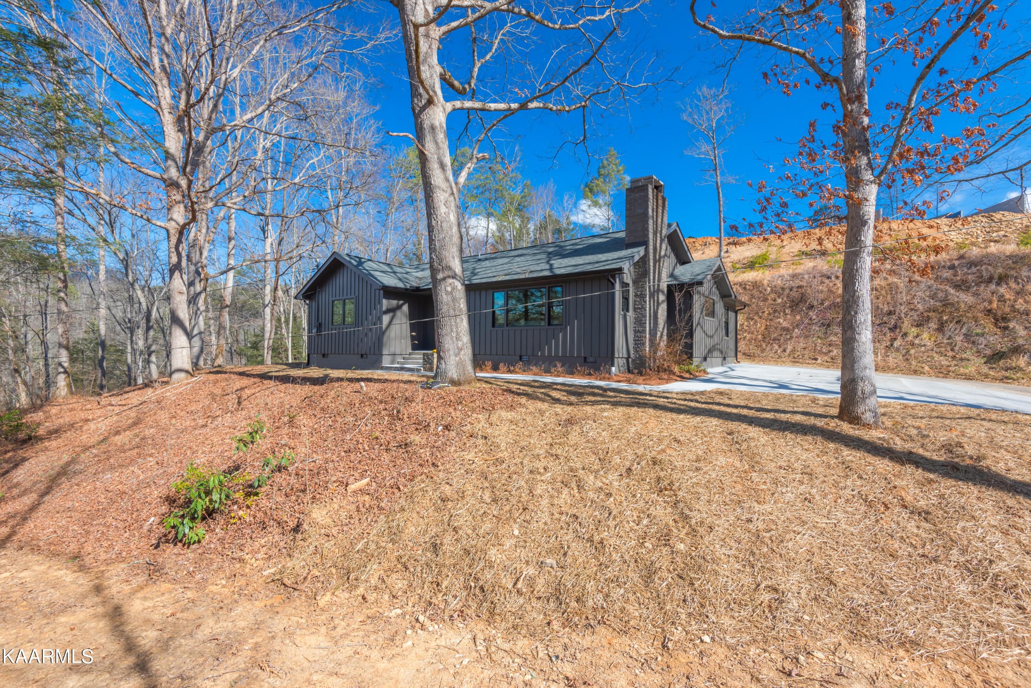 306 Glades Road Gatlinburg, TN 37738 - Photo 2 of 46 a view of a house with a snow in the yard