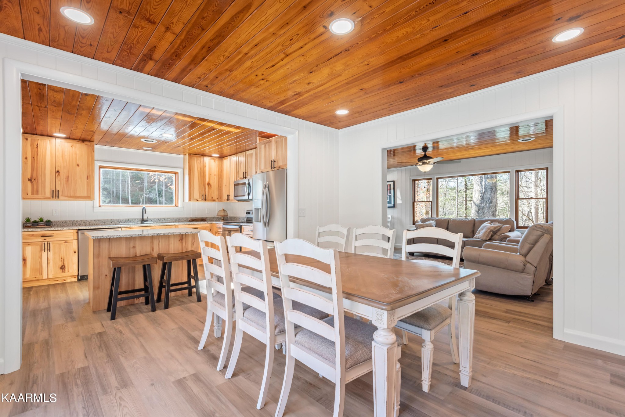 306 Glades Road Gatlinburg, TN 37738 - Photo 24 of 46 a dining room with furniture window wooden floor