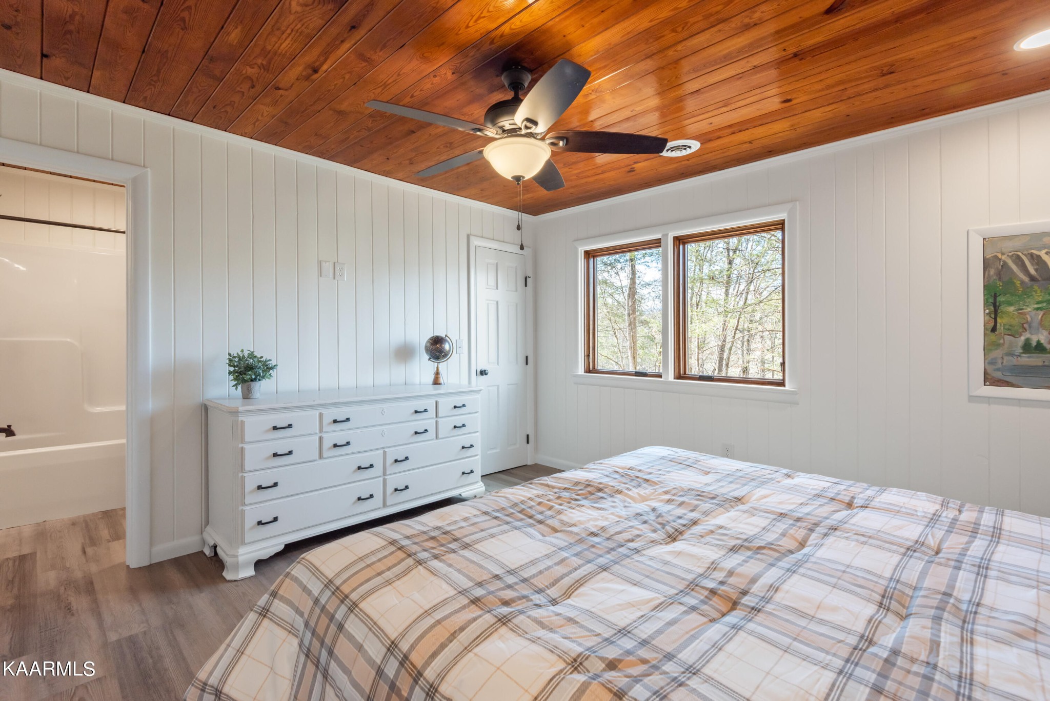 306 Glades Road Gatlinburg, TN 37738 - Photo 36 of 46 a bedroom with a bed dresser and a window