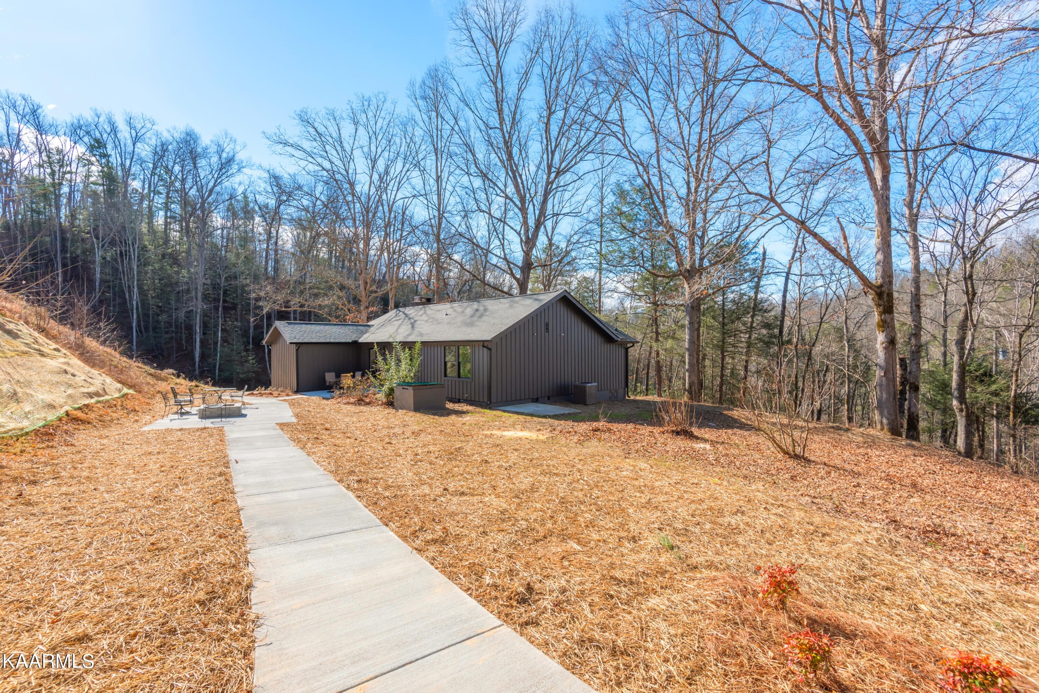 306 Glades Road Gatlinburg, TN 37738 - Photo 42 of 46 a pathway of a house with snow on the road