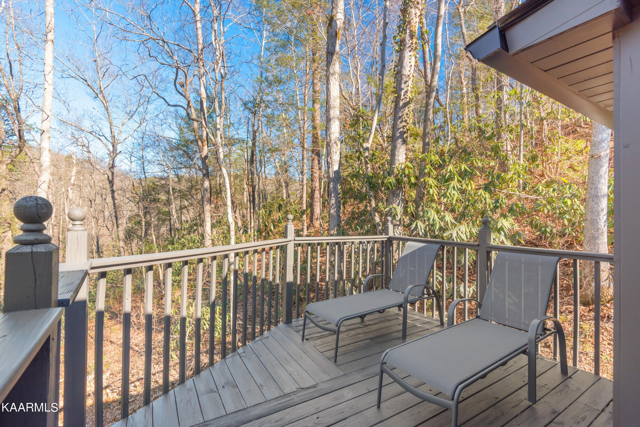 306 Glades Road Gatlinburg, TN 37738 - Photo 10 of 46 a view of balcony with wooden floor and seating space