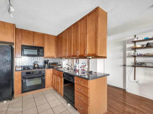 $329,900 | 9715 Woods Drive, Unit 1104, Skokie, IL 60077