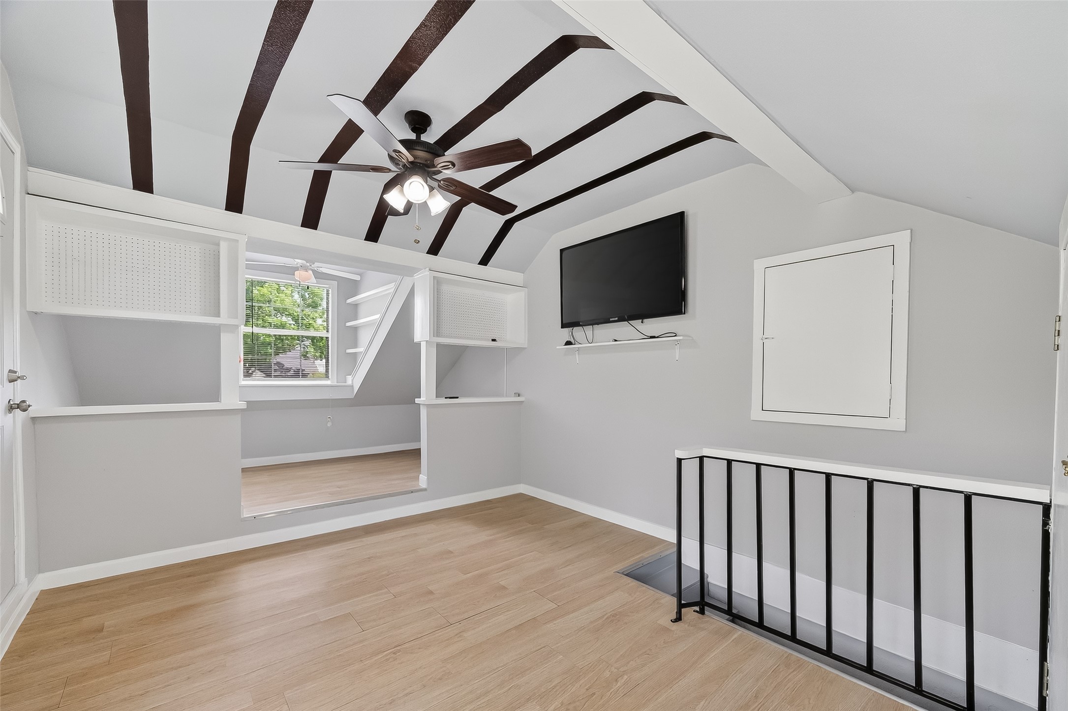 7404 Erath Street Houston, TX 77023 - Photo 17 of 40 a view of a livingroom with an empty space and a window