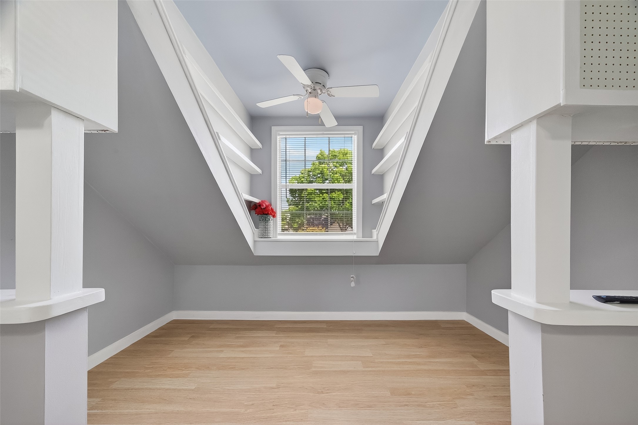 7404 Erath Street Houston, TX 77023 - Photo 18 of 40 wooden floor in an empty room with a window