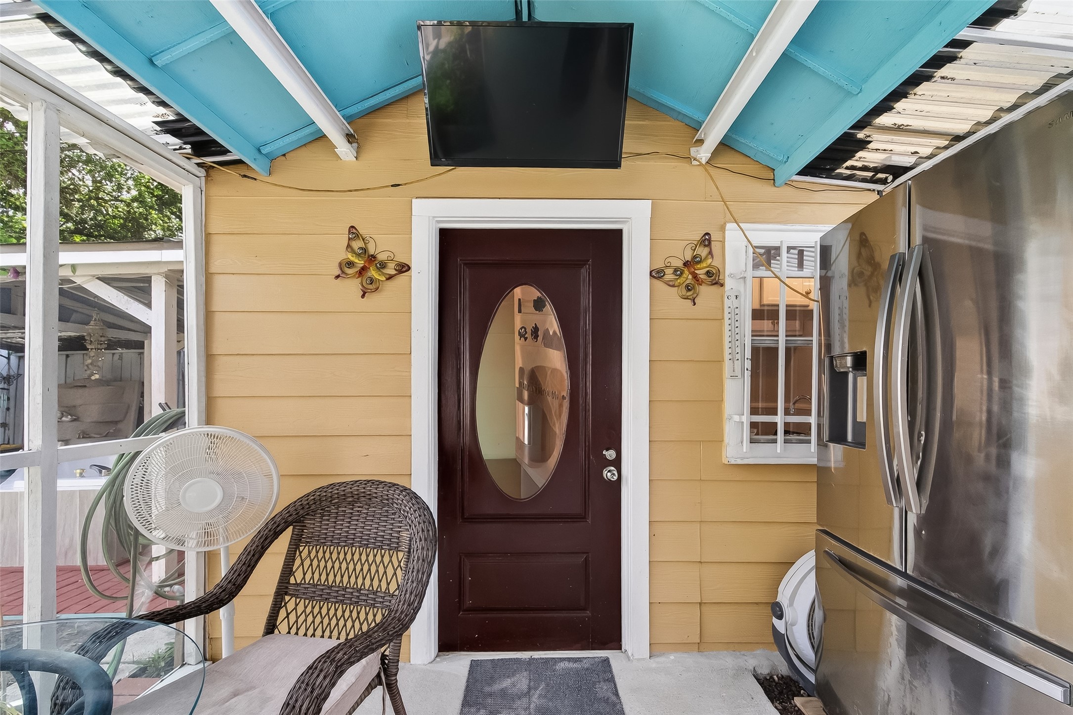 7404 Erath Street Houston, TX 77023 - Photo 25 of 40 a front view of a house with wooden floor and furniture