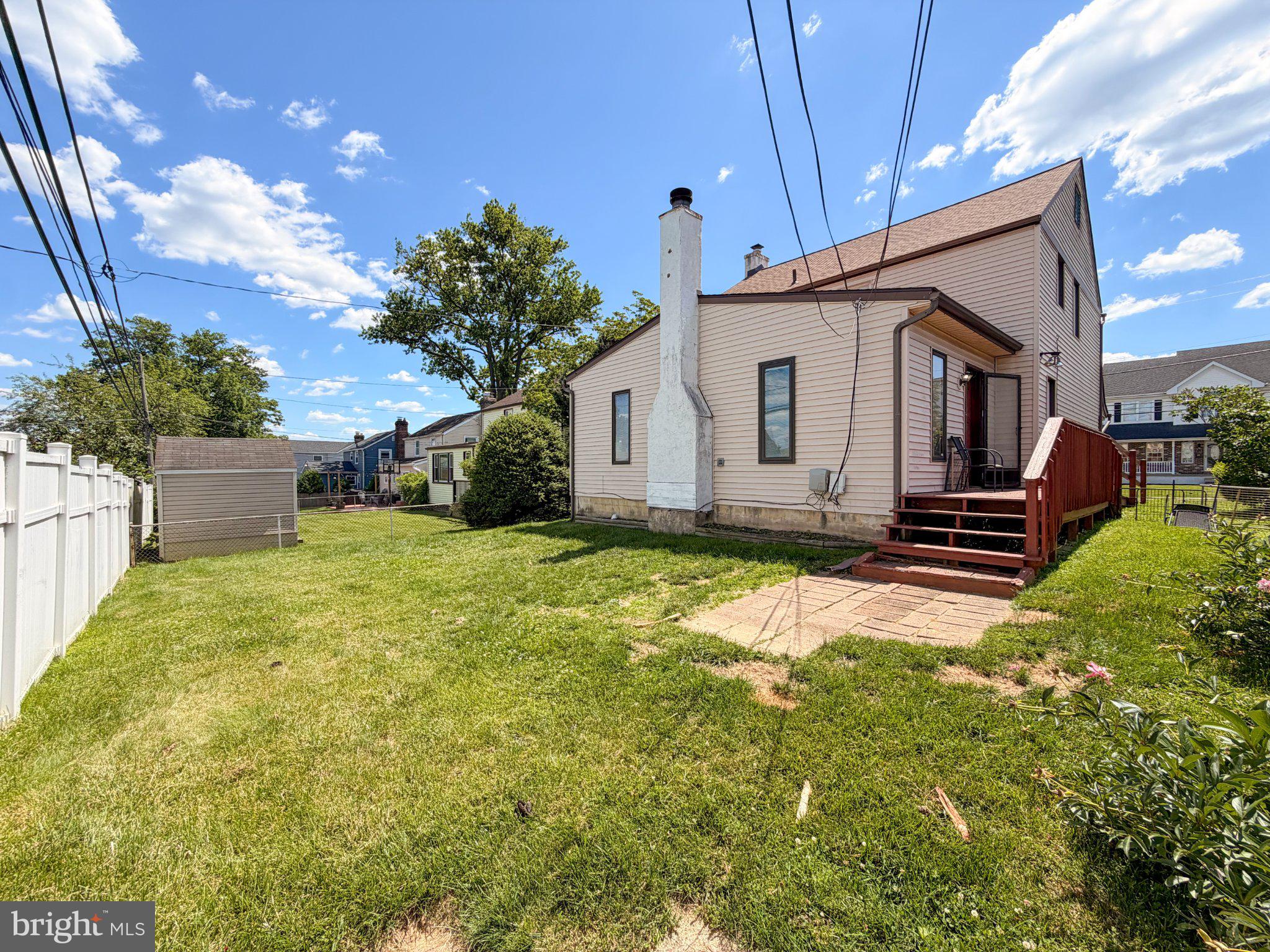 646 Amosland Road Morton, PA 19070 - Photo 9 of 11 Charming backyard with sunny skies.