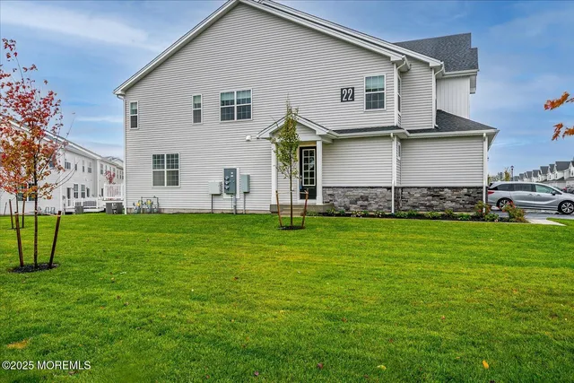 a view of a balcony with wooden floor
