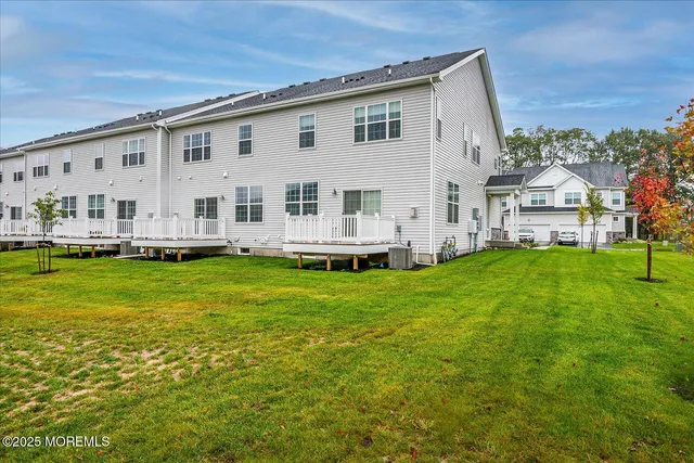 front view of a house with a swimming pool
