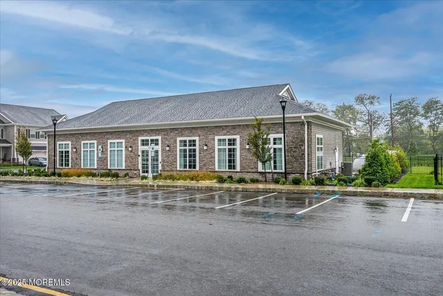 a view of a swimming pool with a lounge chair