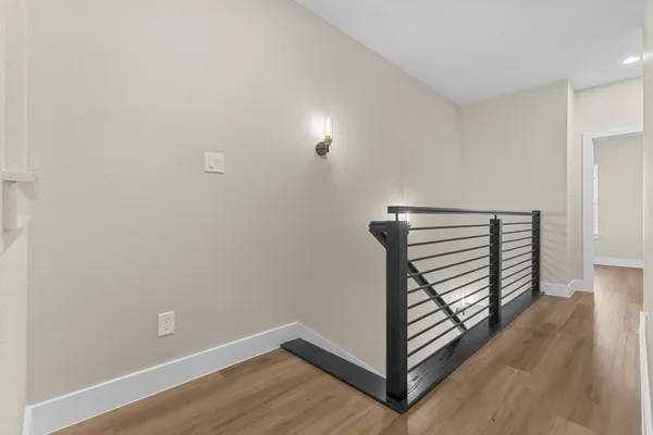 a view of a bathroom from a hallway