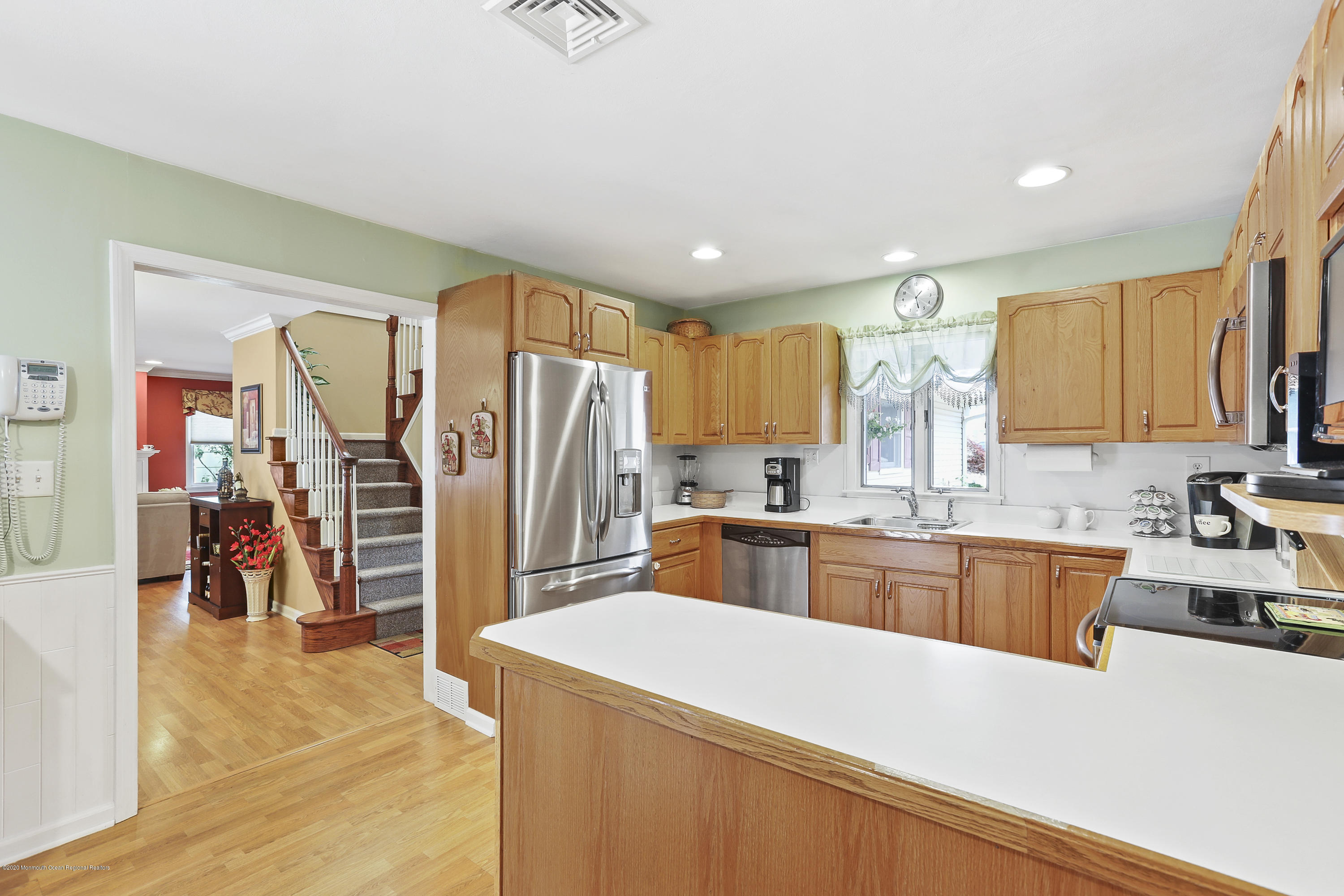 16 Donna Place Aberdeen, NJ 07747 - Photo 7 of 27 16 DONNA PLACE KITCHEN VIEW INTO STAIRCA