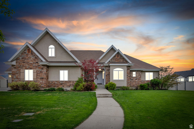 1355 West 1000 South Mapleton, UT 84664 - Photo 59 of 74 View of front of home featuring stone siding, stucco siding, and a lawn