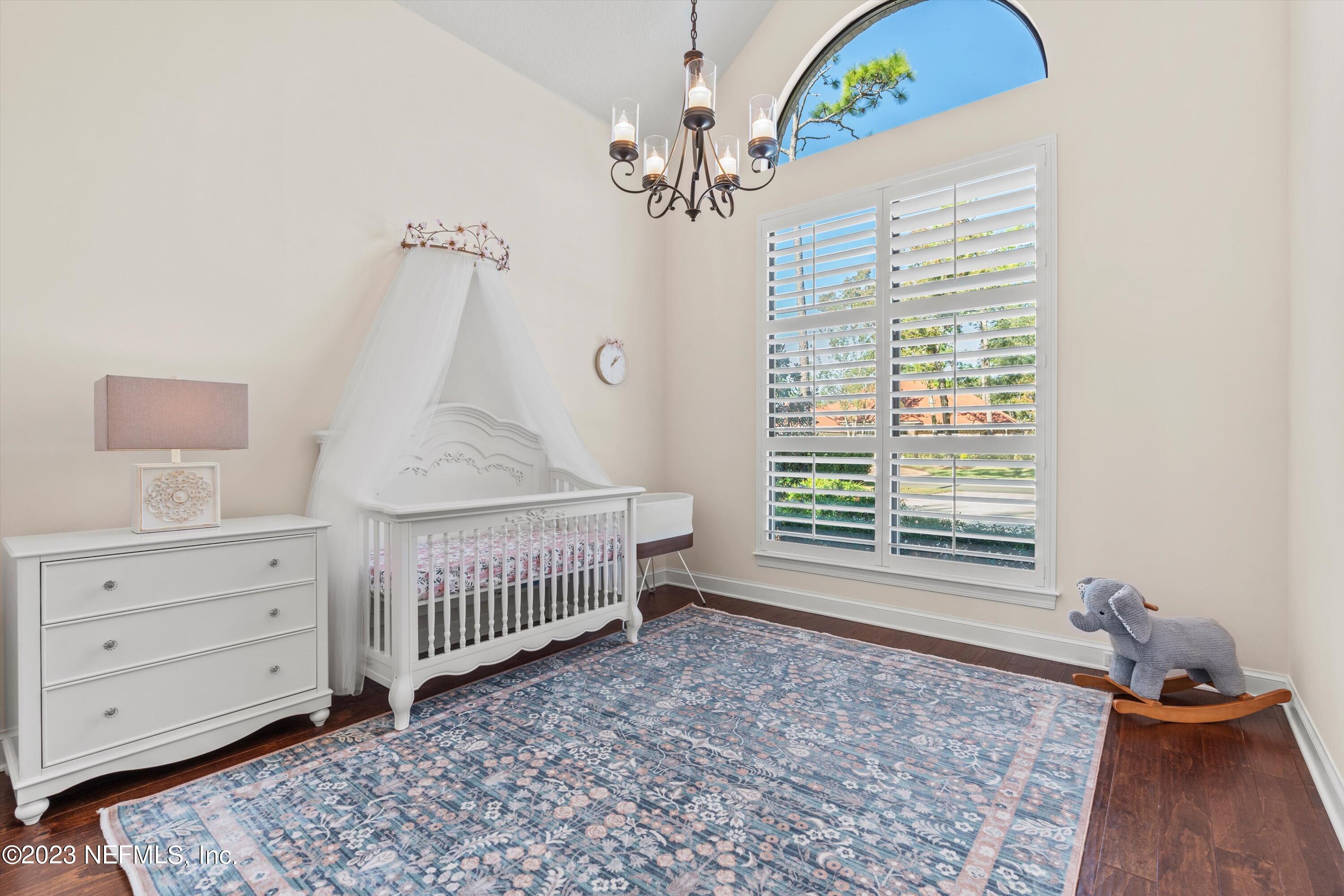 13062 Biggin Church Road South Jacksonville, FL 32224 - Photo 19 of 56 a bedroom with a bed and a window