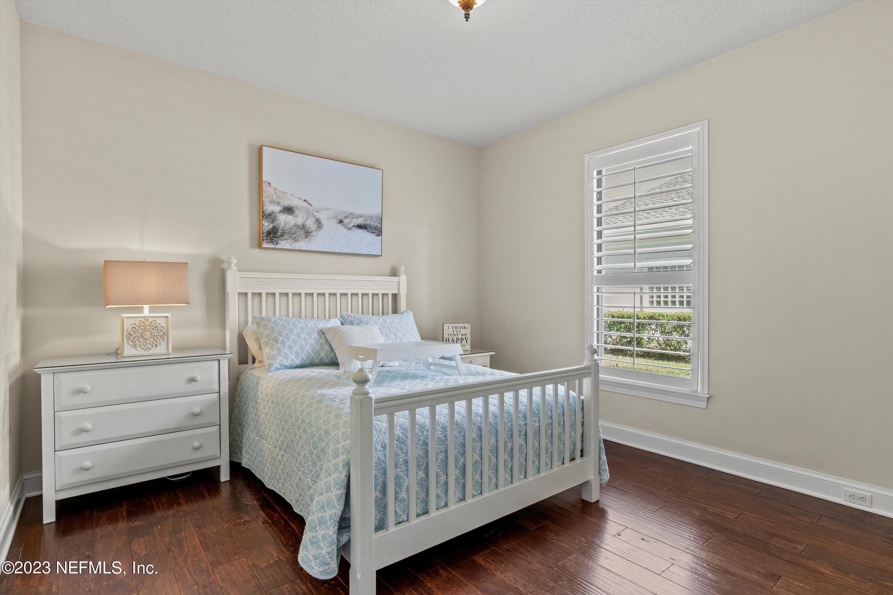 13062 Biggin Church Road South Jacksonville, FL 32224 - Photo 23 of 56 a bedroom that has a bed and a window