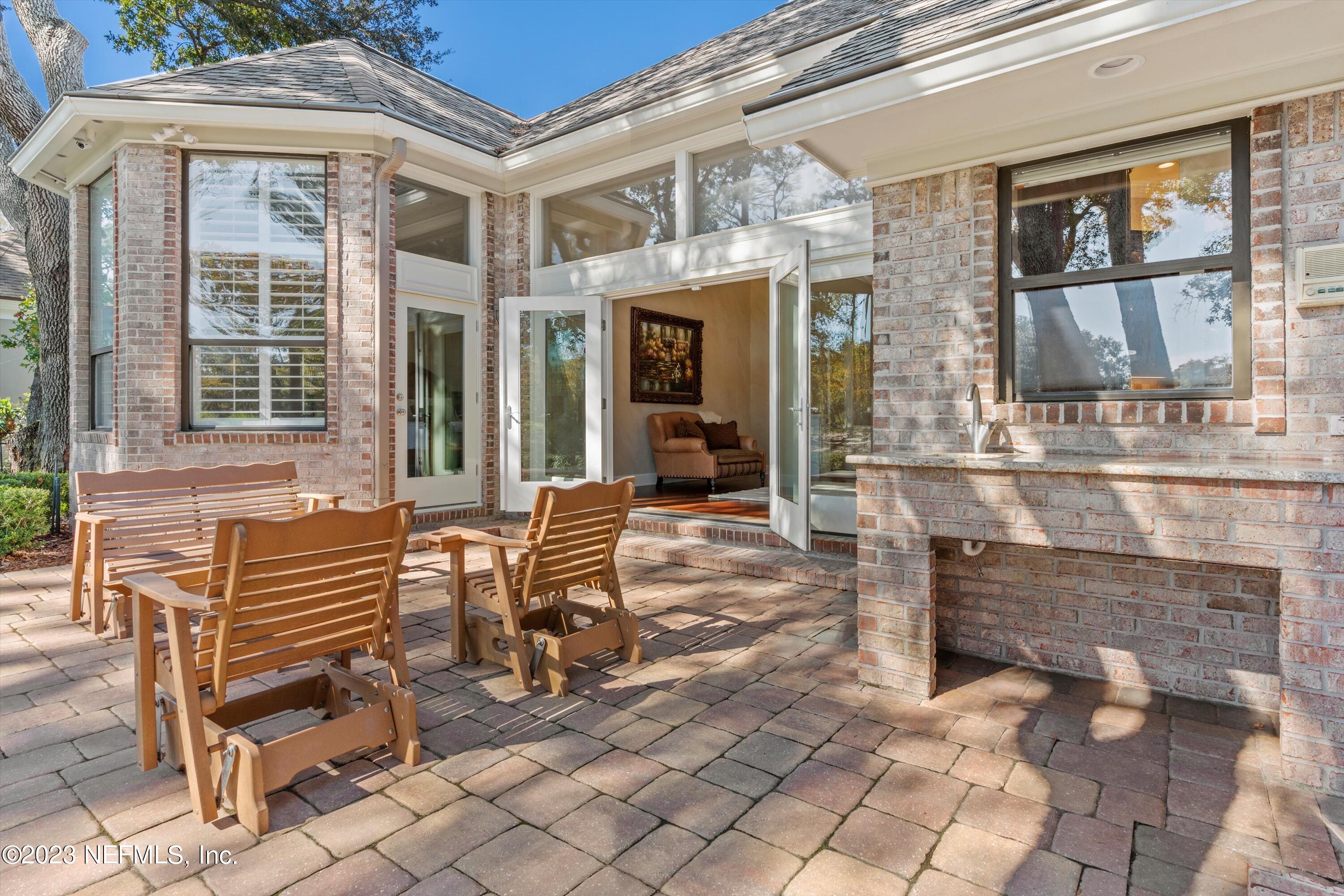 13062 Biggin Church Road South Jacksonville, FL 32224 - Photo 25 of 56 an outdoor view of a brick building with outdoor seating