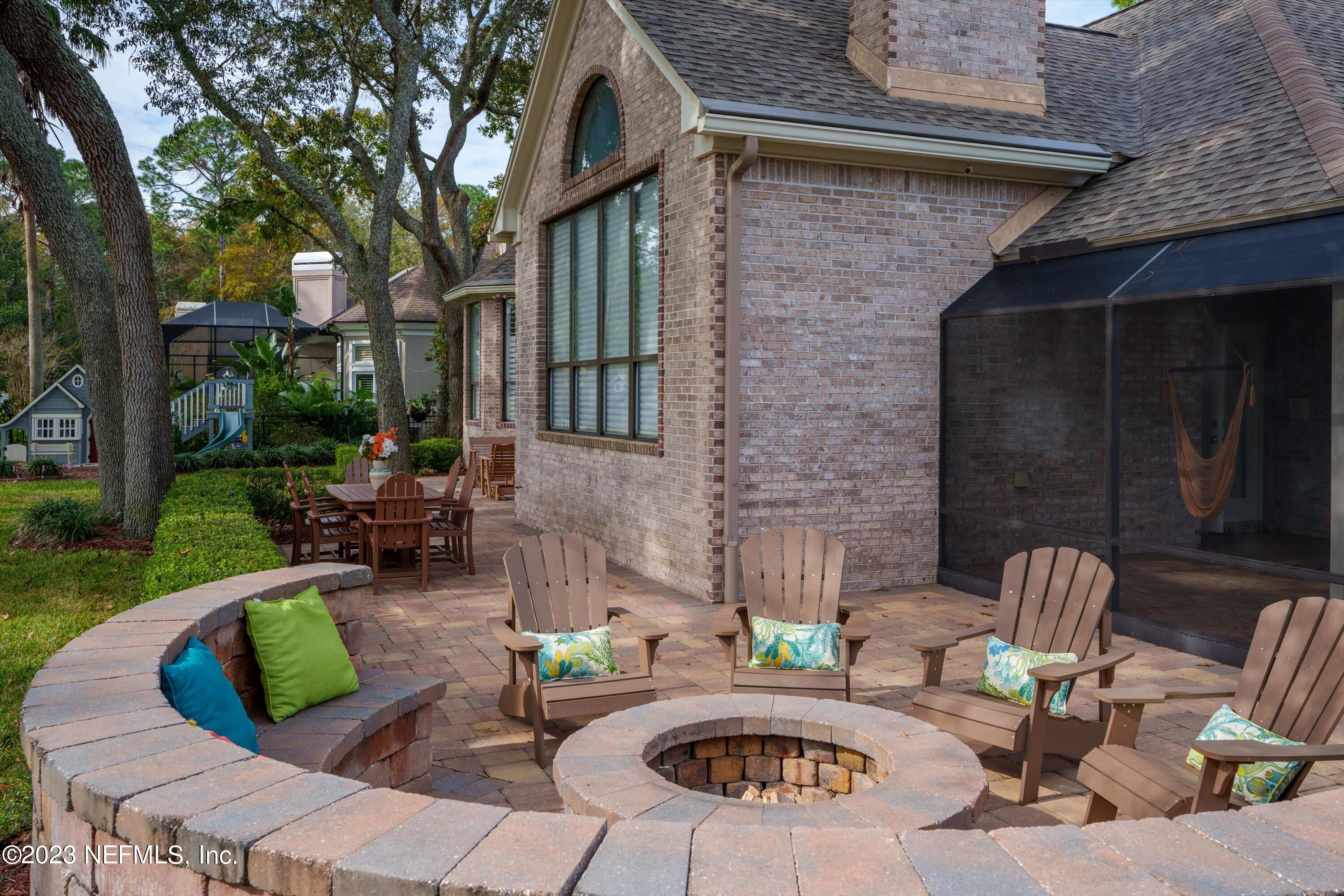 13062 Biggin Church Road South Jacksonville, FL 32224 - Photo 27 of 56 a view of a patio with couches table and chairs with garden view