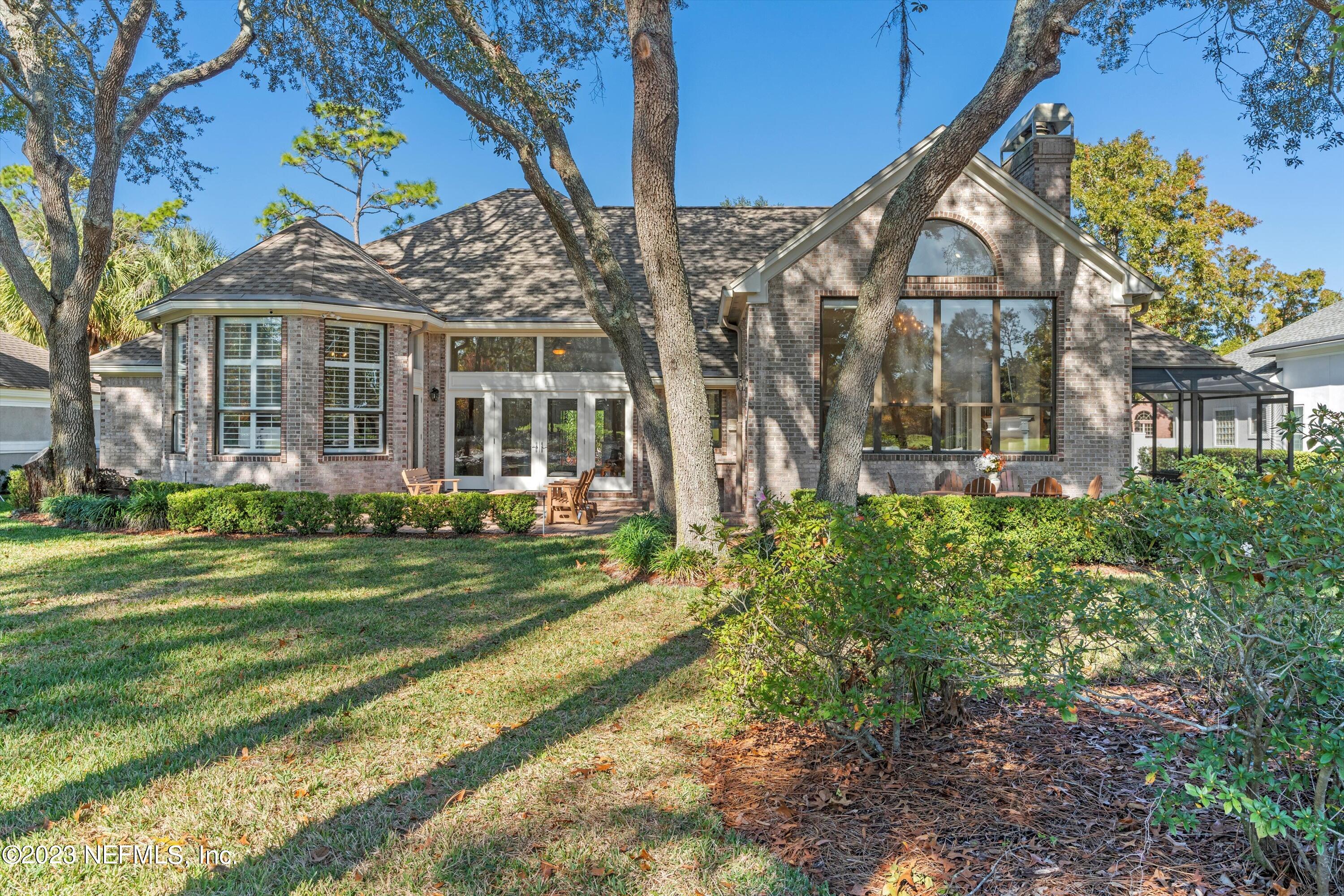 13062 Biggin Church Road South Jacksonville, FL 32224 - Photo 30 of 56 a front view of a house with a garden