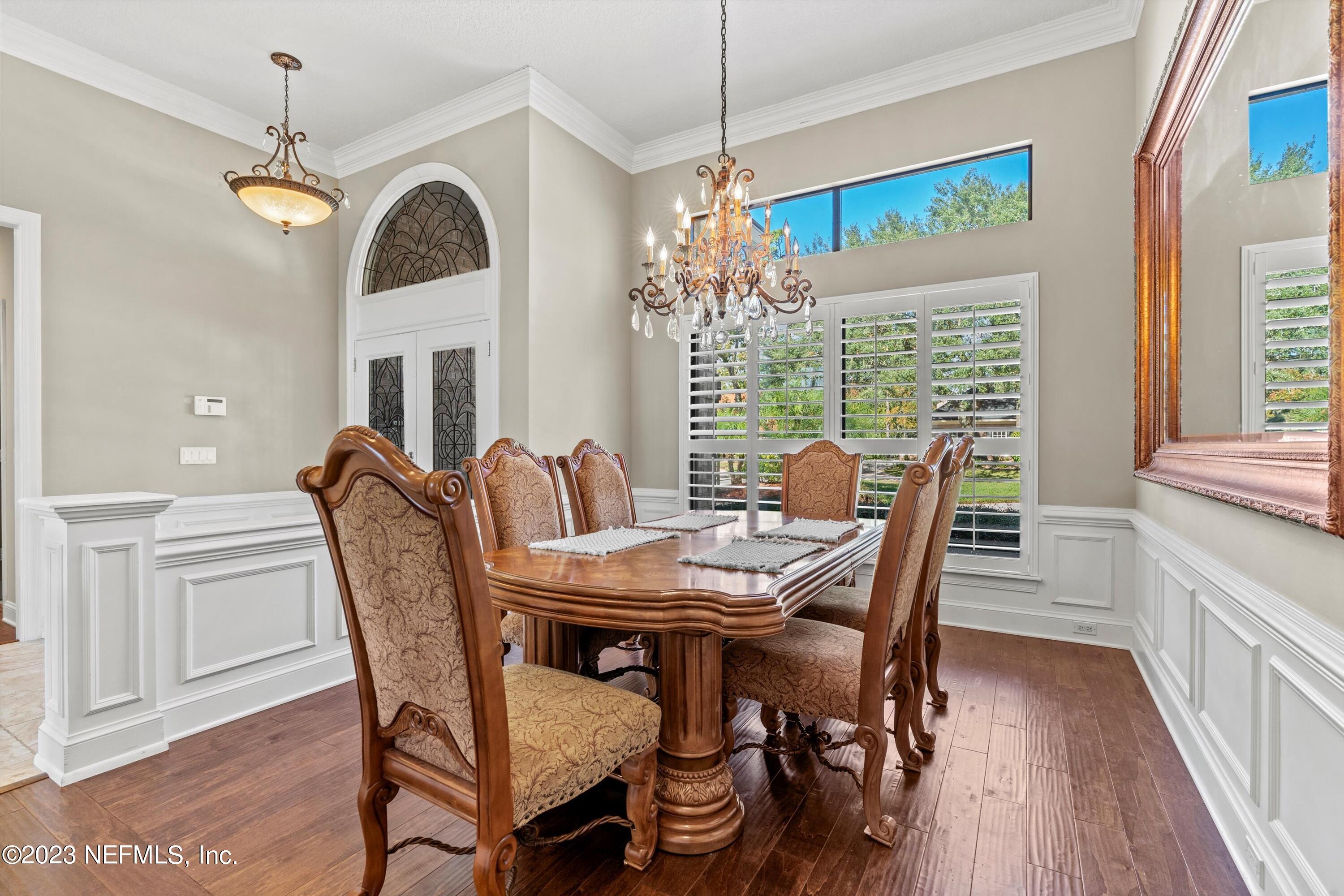 13062 Biggin Church Road South Jacksonville, FL 32224 - Photo 4 of 56 a view of a dining room with furniture window and wooden floor