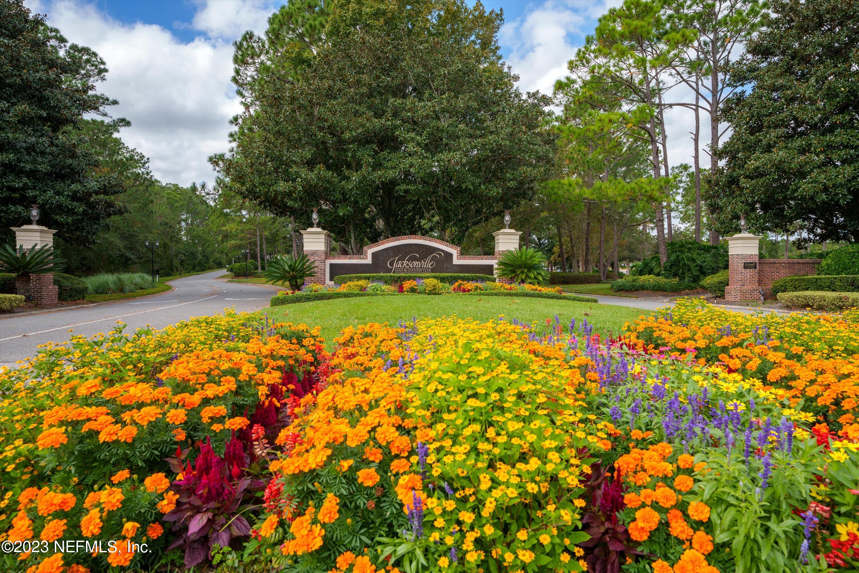 13062 Biggin Church Road South Jacksonville, FL 32224 - Photo 41 of 56 a view of yard with swimming pool and trees
