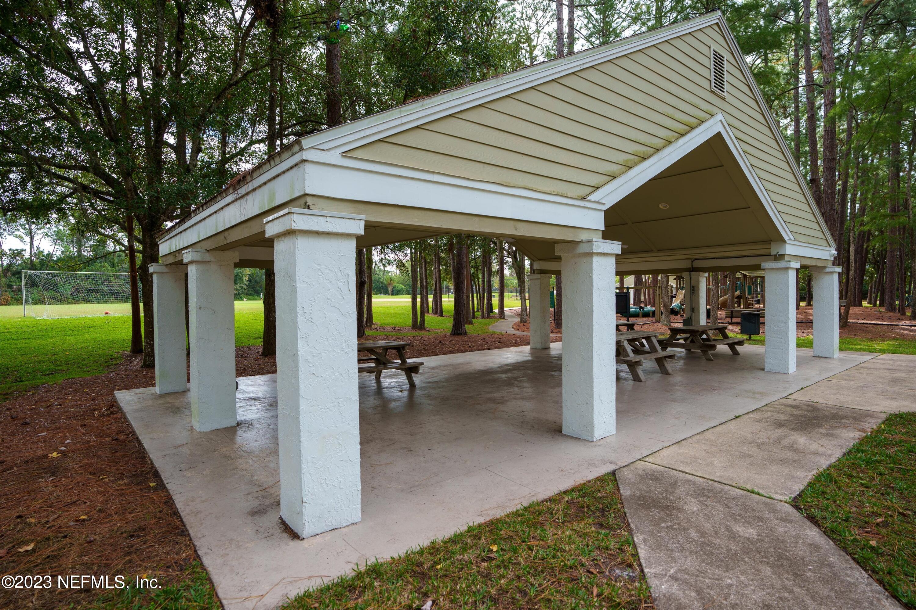13062 Biggin Church Road South Jacksonville, FL 32224 - Photo 49 of 56 a view of a house with backyard and porch