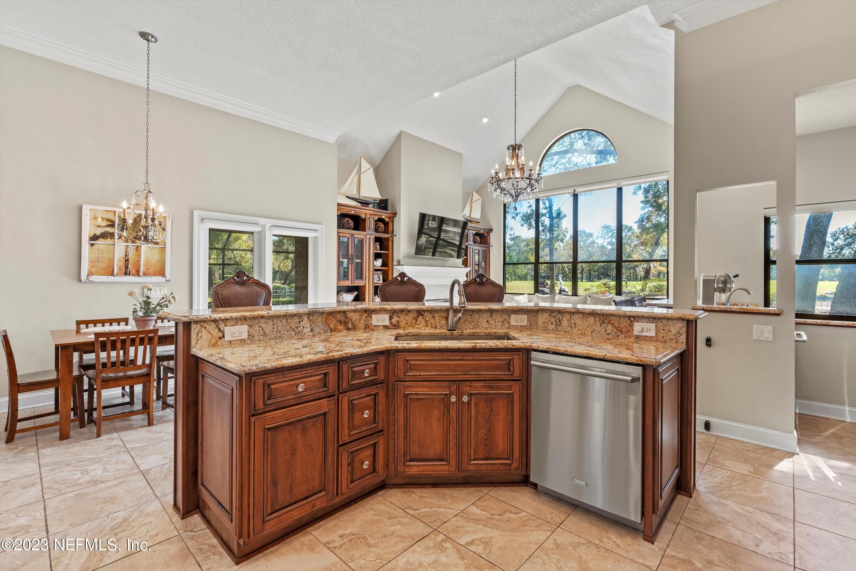13062 Biggin Church Road South Jacksonville, FL 32224 - Photo 9 of 56 a kitchen with a sink stove and cabinets