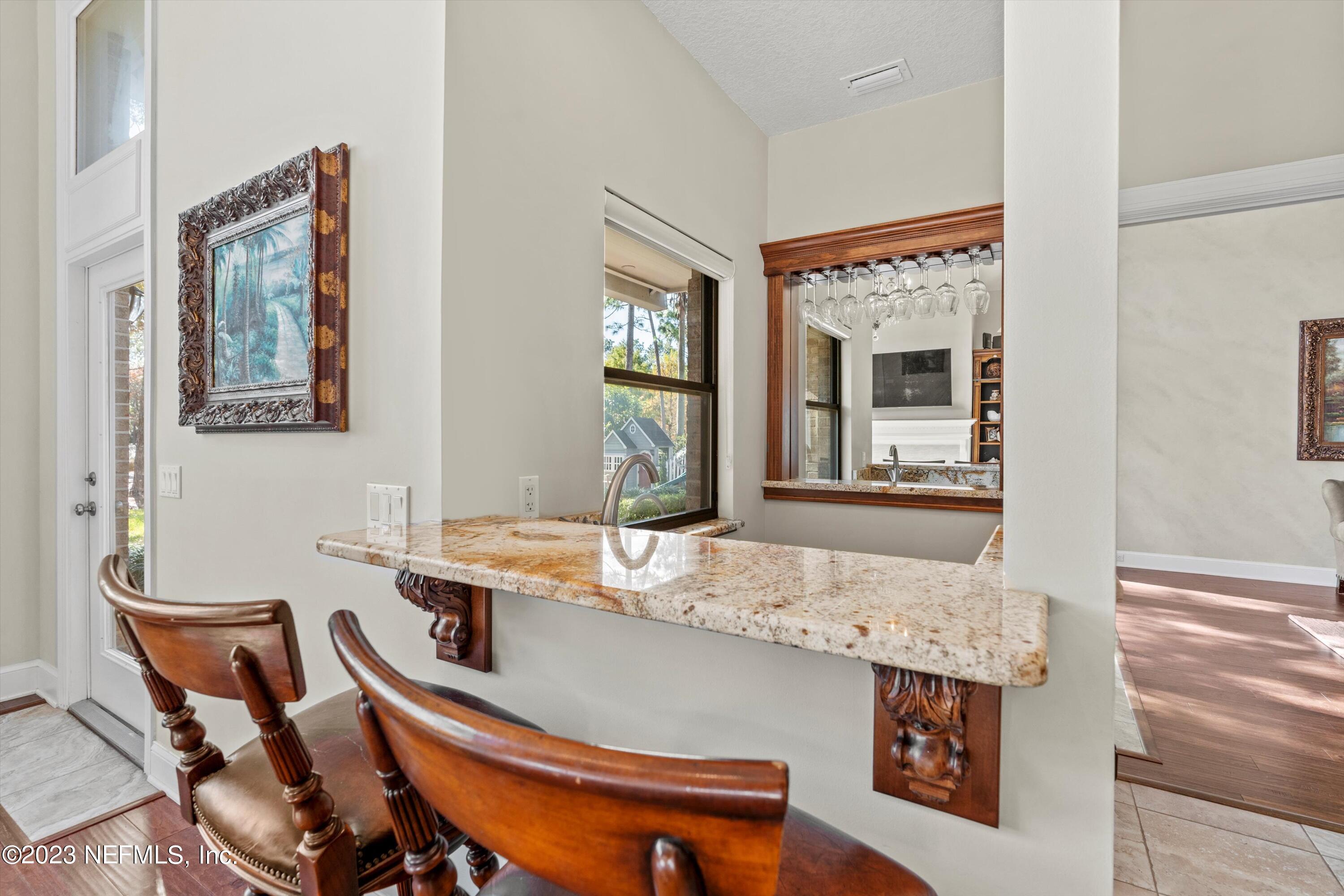 13062 Biggin Church Road South Jacksonville, FL 32224 - Photo 10 of 56 a room with table and chairs