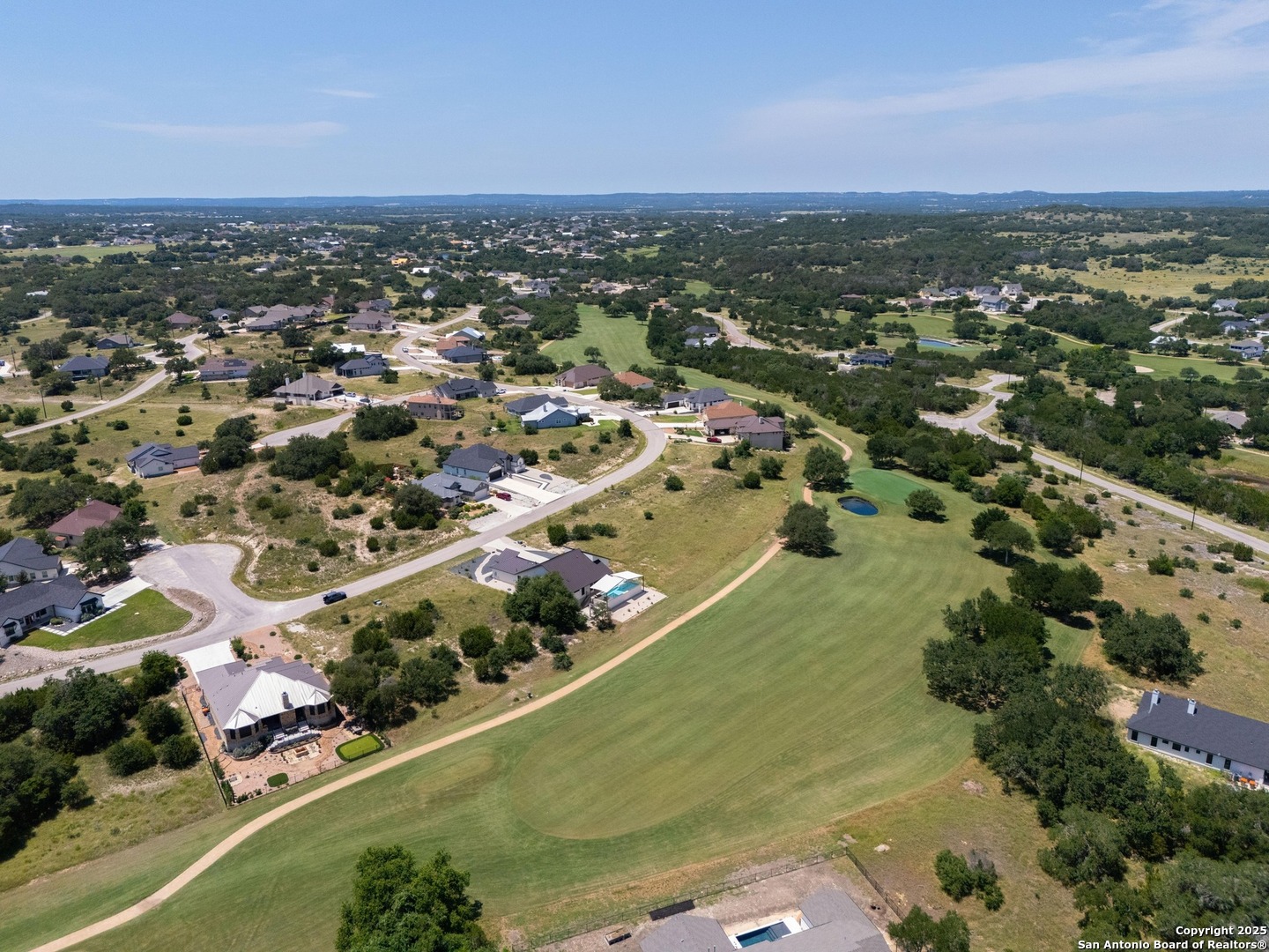 227 Lewis Todd Blanco, TX 78606 - Photo 2 of 12 an aerial view of residential houses with outdoor space