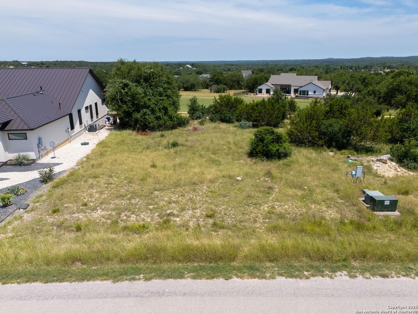 227 Lewis Todd Blanco, TX 78606 - Photo 7 of 12 a view of a pathway both side of yard