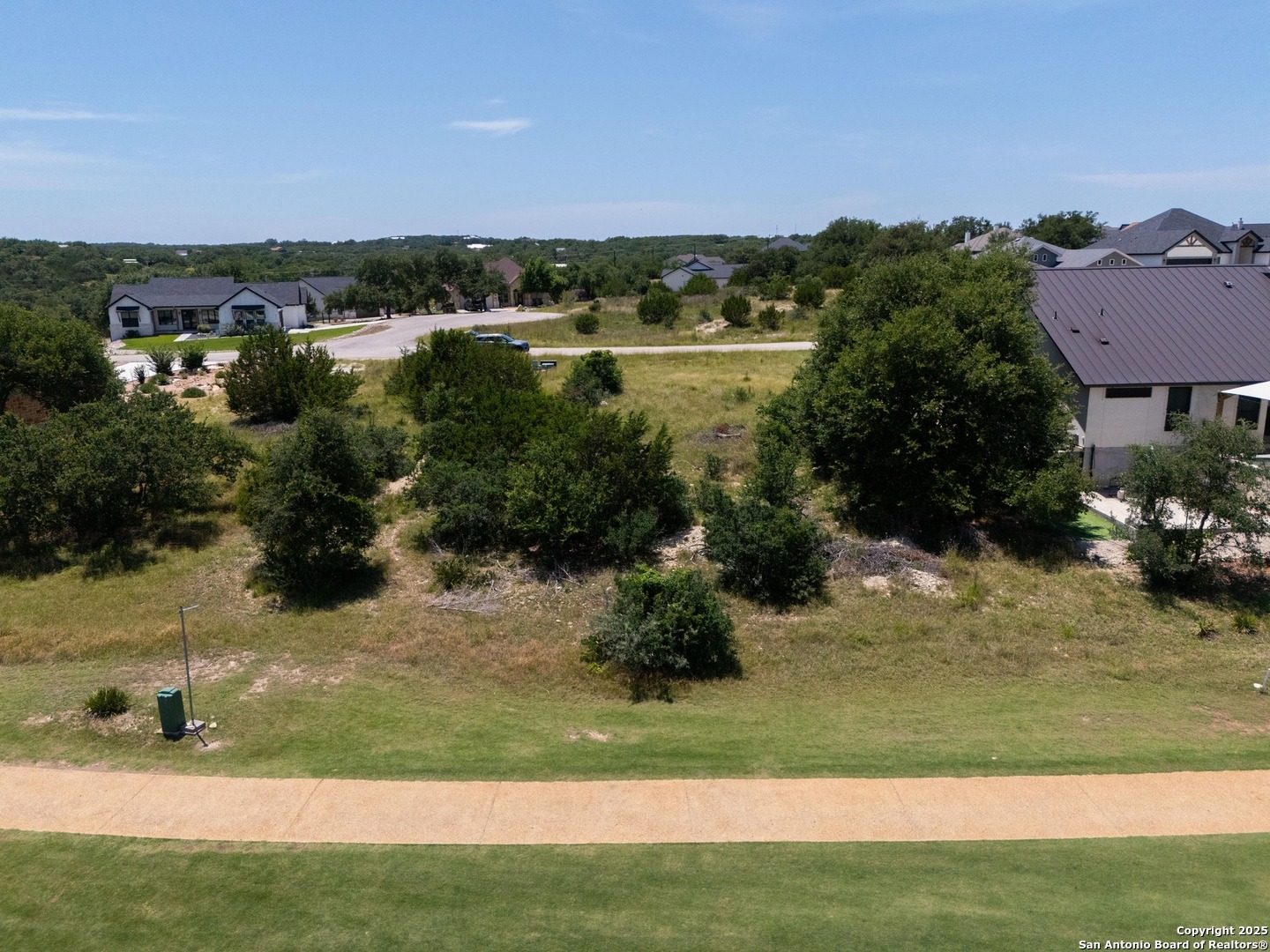 227 Lewis Todd Blanco, TX 78606 - Photo 9 of 12 a view of a lake with houses
