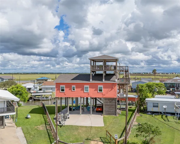 an outdoor space with lots of table and chairs