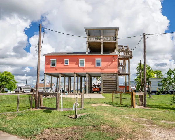 a sign on the side of the house