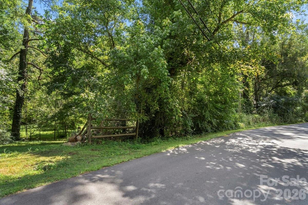 0 Bell Street Mount Holly, NC 28120 - Photo 2 of 10 a view of a yard with plants and trees