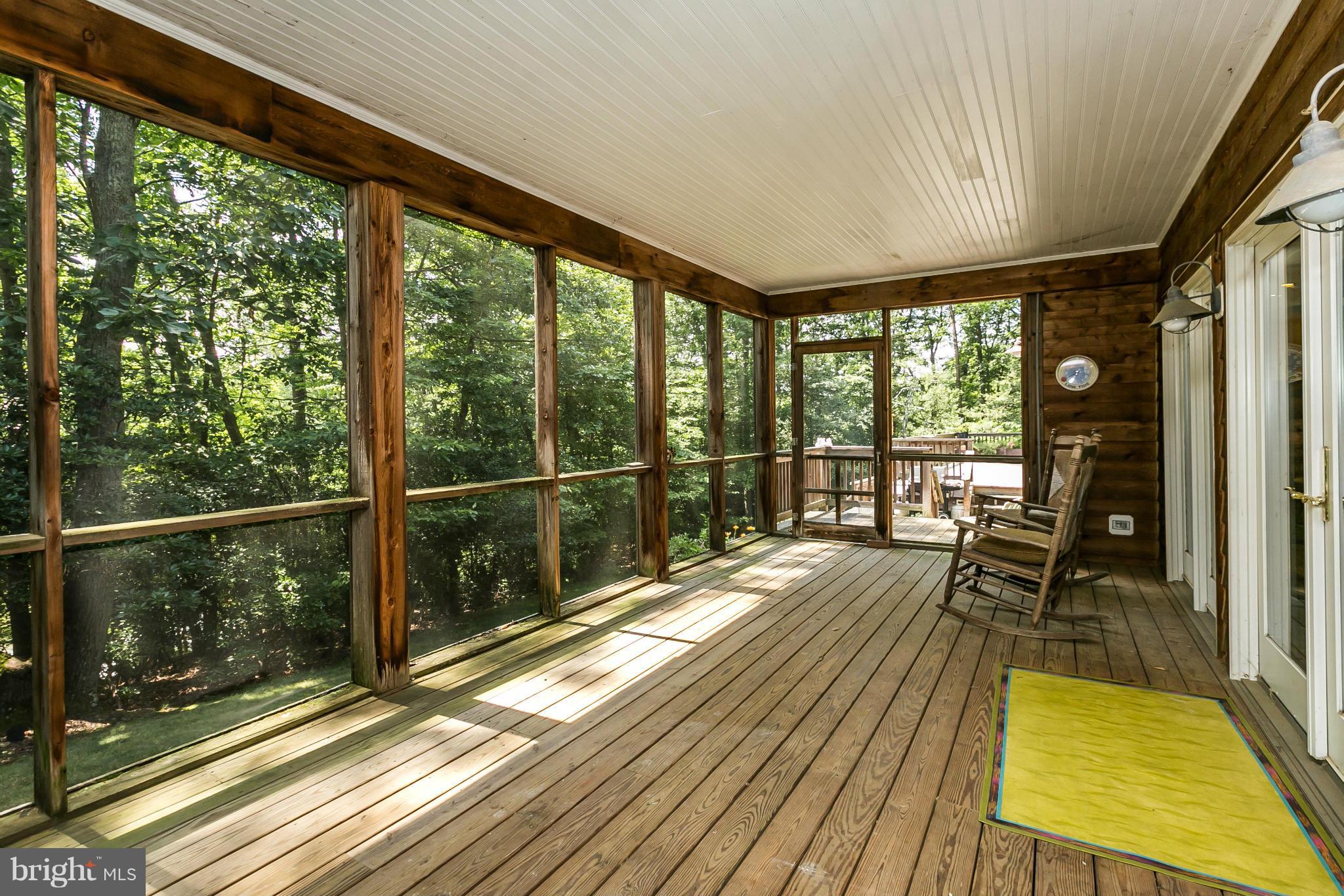 126 Gilbert Court Edgewater, MD 21037 - Photo 25 of 30 a view of a balcony with wooden floor