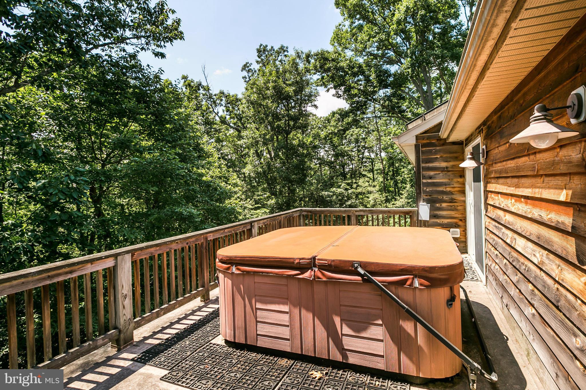 126 Gilbert Court Edgewater, MD 21037 - Photo 26 of 30 a view of a two chairs in the roof deck