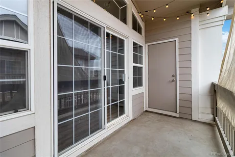 a view of empty room with windows