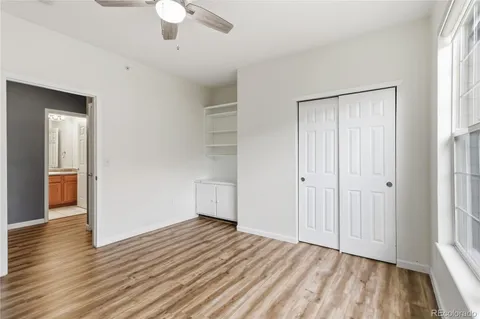 a view of an empty room and glass door