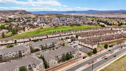 an aerial view of a city with lots of residential buildings