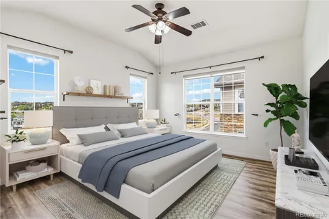a bedroom with bed and a window