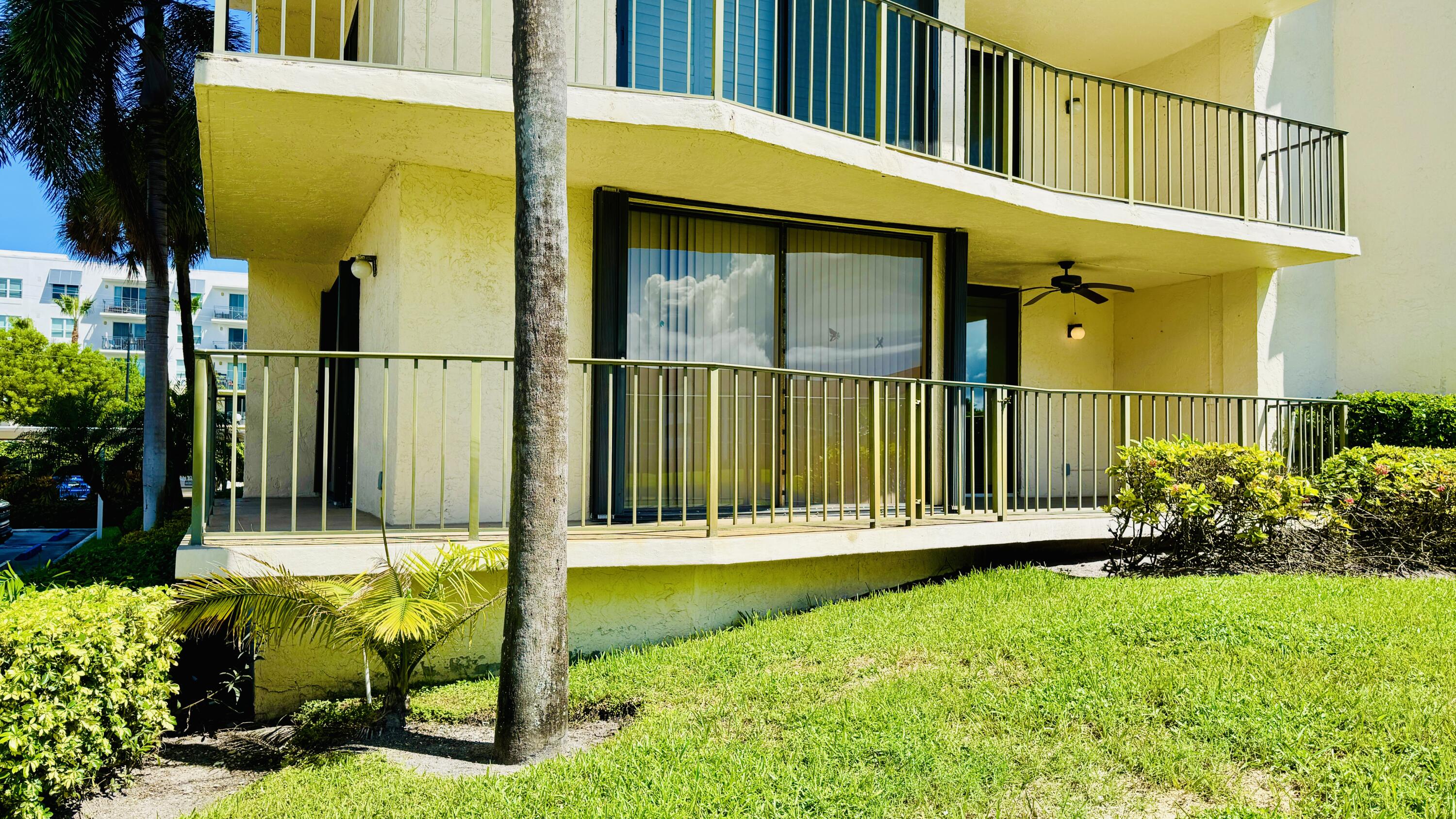 7030 Half Moon Circle, Unit 121 Hypoluxo, FL 33462 - Photo 31 of 74 Wraparound patio