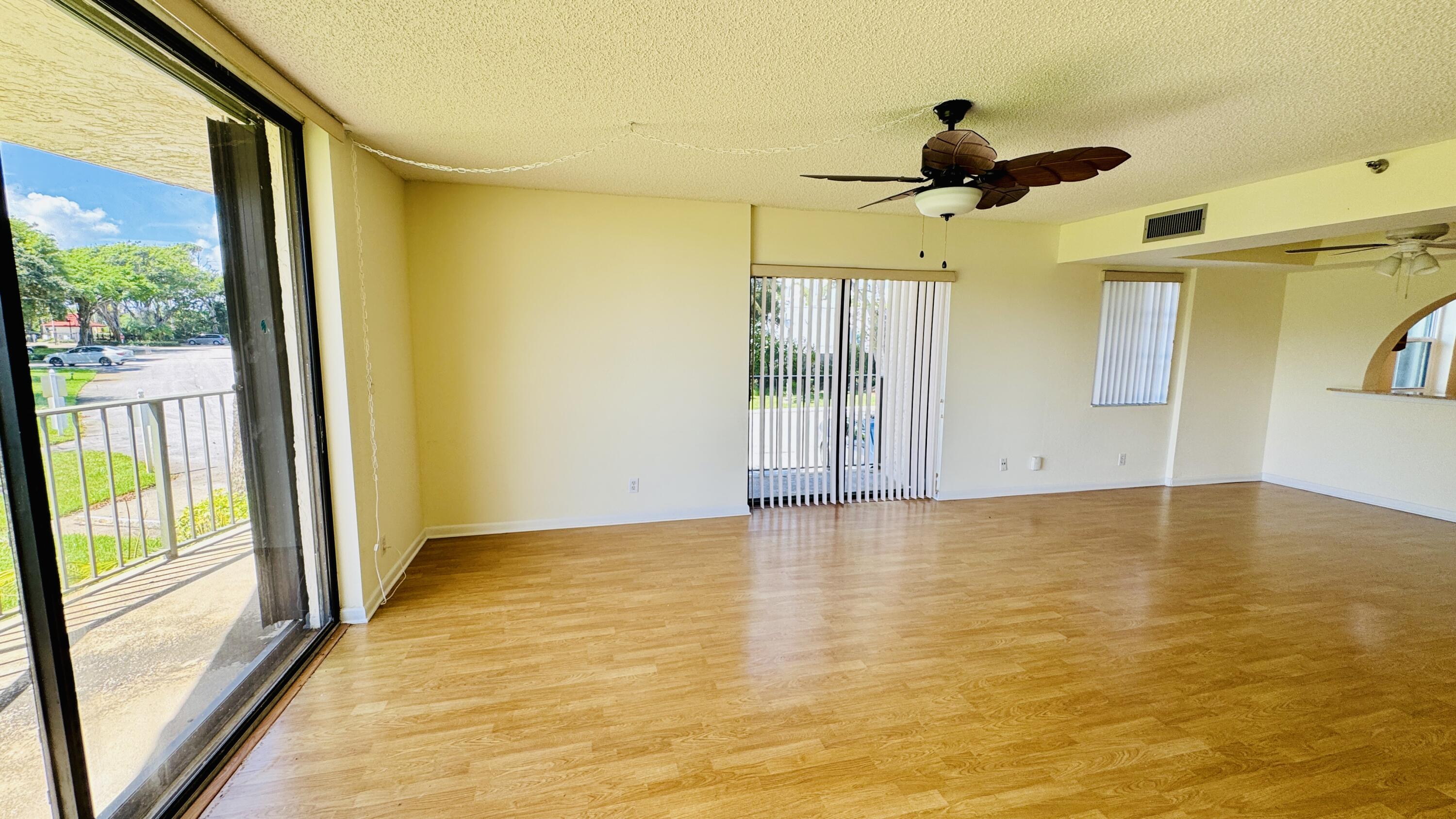 7030 Half Moon Circle, Unit 121 Hypoluxo, FL 33462 - Photo 40 of 74 Bright living room